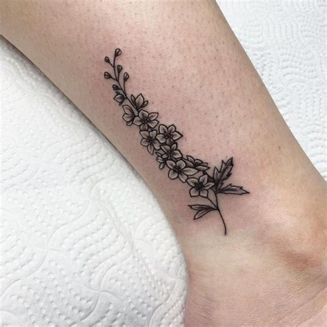 july birth flower tattoo